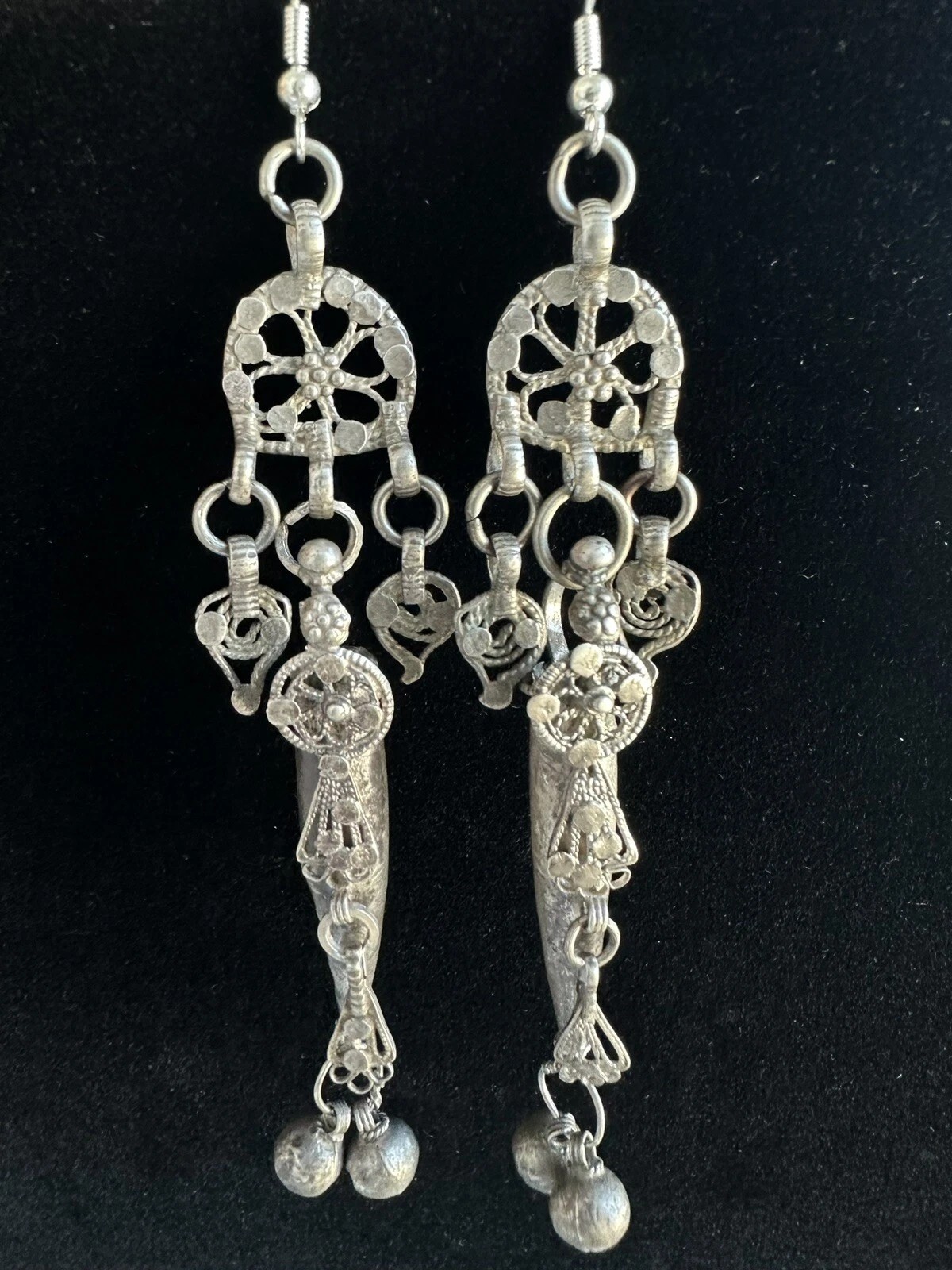 Yemeni Bowsani antique filigree earrings, front view with silver bell drops